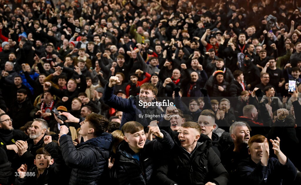 27 February 2026; Bohemians supporters celebrate as Colm Whelan scores their side's second goal, a penalty, during the SSE Airtricity Men's Premier Division match between Bohemians and Shamrock Rovers at Dalymount Park in Dublin. Photo by Stephen McCarthy/Sportsfile