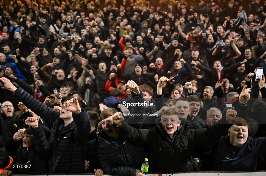 27 February 2026; Bohemians supporters celebrate as Colm Whelan scores their side's second goal, a penalty, during the SSE Airtricity Men's Premier Division match between Bohemians and Shamrock Rovers at Dalymount Park in Dublin. Photo by Stephen McCarthy/Sportsfile