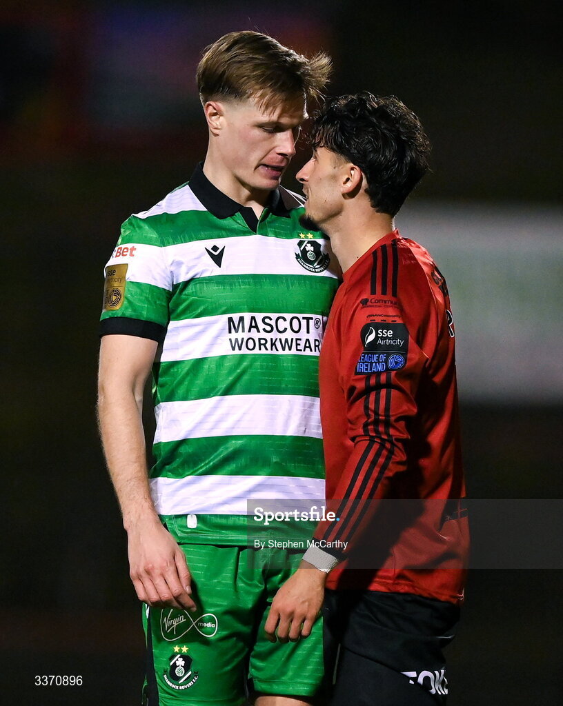 27 February 2026; Connor Parsons of Bohemians, centre, and Daniel Cleary of Shamrock Rovers tussle during the SSE Airtricity Men's Premier Division match between Bohemians and Shamrock Rovers at Dalymount Park in Dublin. Photo by Stephen McCarthy/Sportsfile