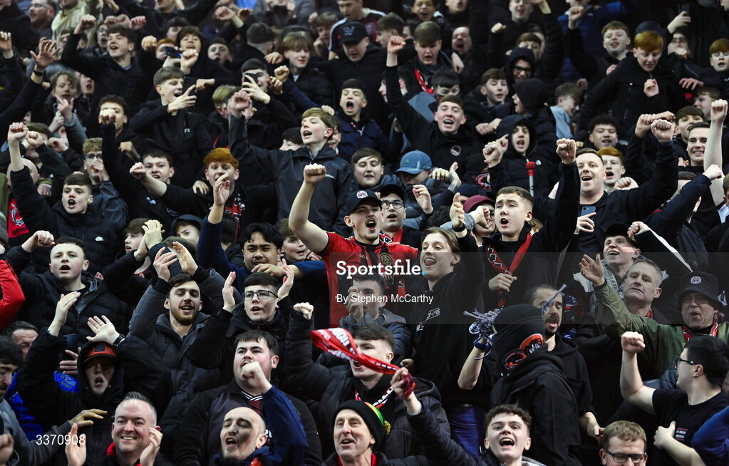 27 February 2026; Bohemians supporters celebrate as Colm Whelan scores their side's second goal, a penalty, during the SSE Airtricity Men's Premier Division match between Bohemians and Shamrock Rovers at Dalymount Park in Dublin. Photo by Stephen McCarthy/Sportsfile