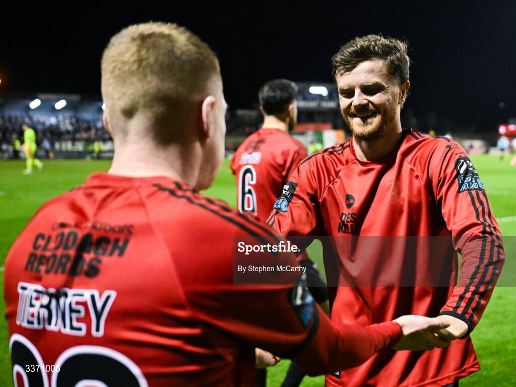 27 February 2026; Ross Tierney of Bohemians, left, celebrates with team-mate Adam McDonnell after scoring their side's third goal during the SSE Airtricity Men's Premier Division match between Bohemians and Shamrock Rovers at Dalymount Park in Dublin. Photo by Stephen McCarthy/Sportsfile