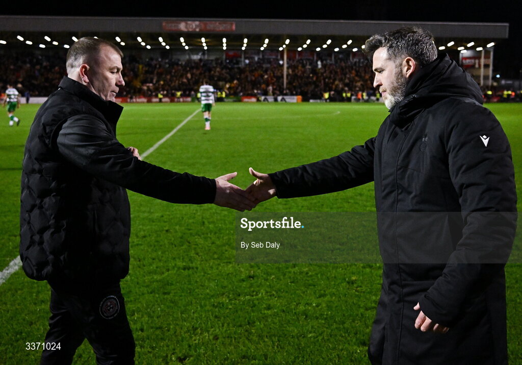 27 February 2026; Bohemians manager Alan Reynolds, left, and Bohemians shake hands after the SSE Airtricity Men's Premier Division match between Bohemians and Shamrock Rovers at Dalymount Park in Dublin. Photo by Seb Daly/Sportsfile