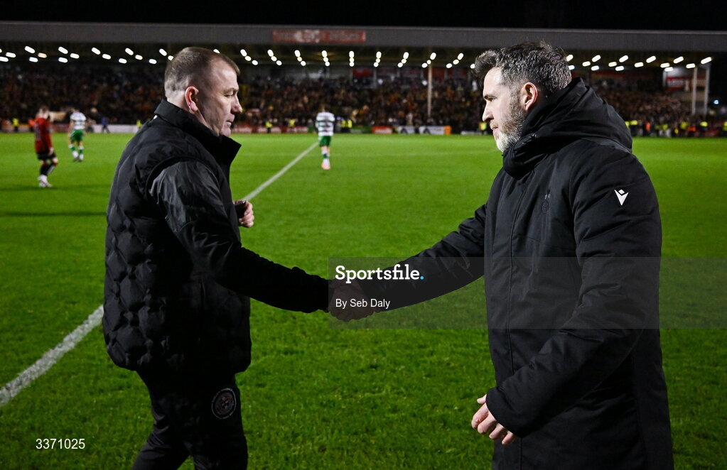 27 February 2026; Bohemians manager Alan Reynolds, left, and Bohemians shake hands after the SSE Airtricity Men's Premier Division match between Bohemians and Shamrock Rovers at Dalymount Park in Dublin. Photo by Seb Daly/Sportsfile