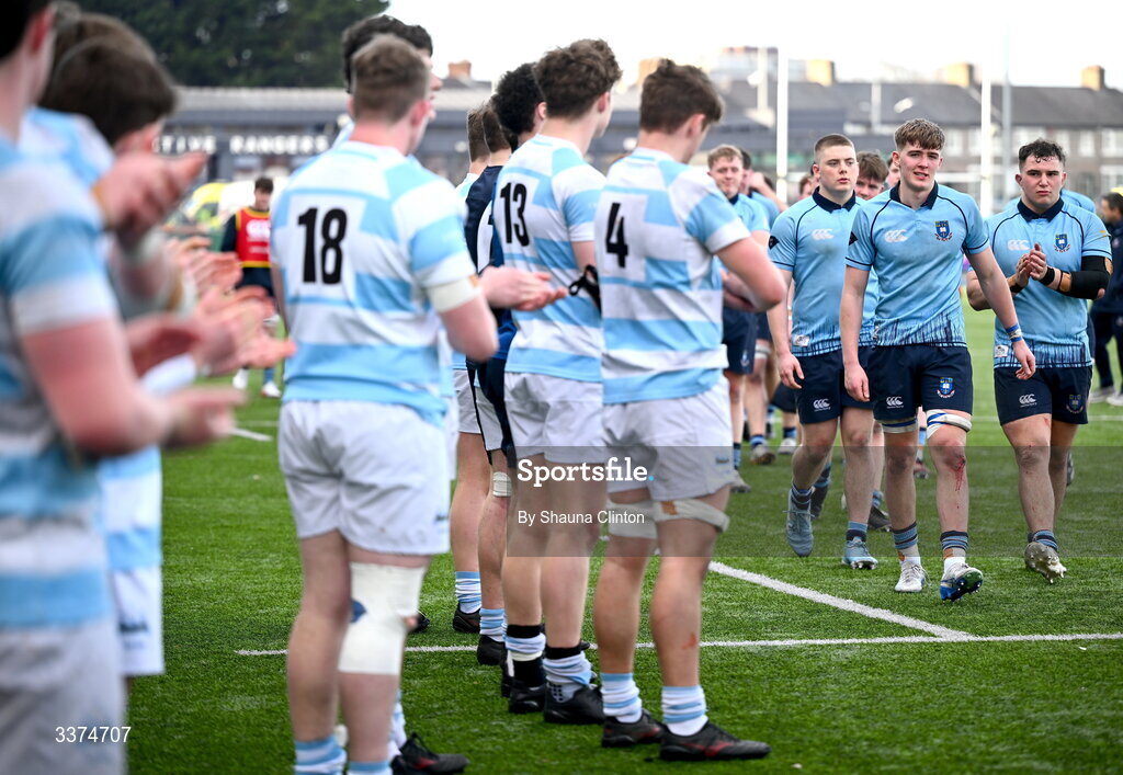 2 March 2026; St Michael's College players, including Herbie Boyle, right, leave the pitch after their side's defeat in the Bank of Ireland Leinster Rugby Boys Schools Senior Cup semi-final match between St Michael's College and Blackrock College at Energia Park in Dublin. Photo by Shauna Clinton/Sportsfile