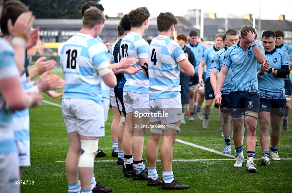 2 March 2026; St Michael's College players, including Herbie Boyle, right, leave the pitch after their side's defeat in the Bank of Ireland Leinster Rugby Boys Schools Senior Cup semi-final match between St Michael's College and Blackrock College at Energia Park in Dublin. Photo by Shauna Clinton/Sportsfile