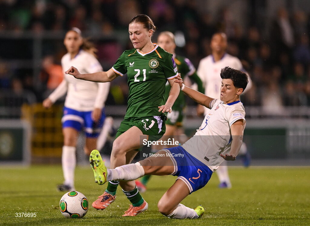 3 March 2026; Emily Murphy of Republic of Ireland is tackled by Elisa De Almeida of France during the 2027 FIFA Women’s World Cup Qualifier match between Republic of Ireland and France at Tallaght Stadium in Dublin. Photo by Stephen McCarthy/Sportsfile