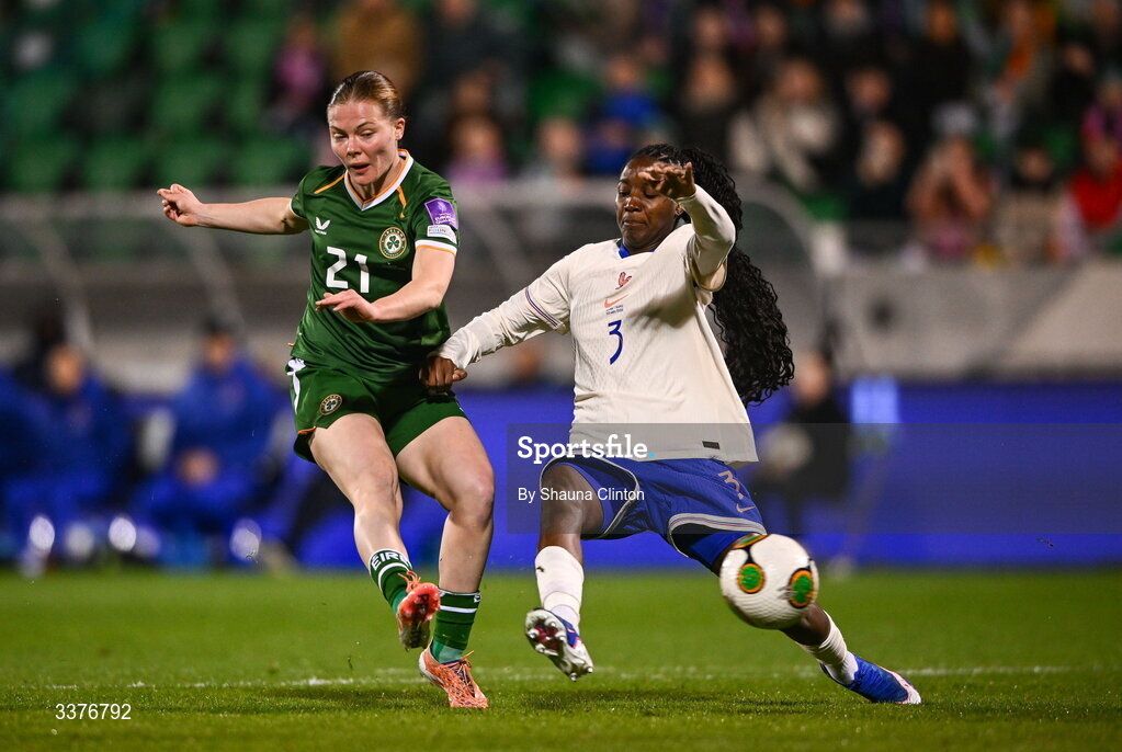3 March 2026; Emily Murphy of Republic of Ireland has a shot on goal despite the attention of Thiniba Samoura of France during the 2027 FIFA Women’s World Cup Qualifier match between Republic of Ireland and France at Tallaght Stadium in Dublin. Photo by Shauna Clinton/Sportsfile