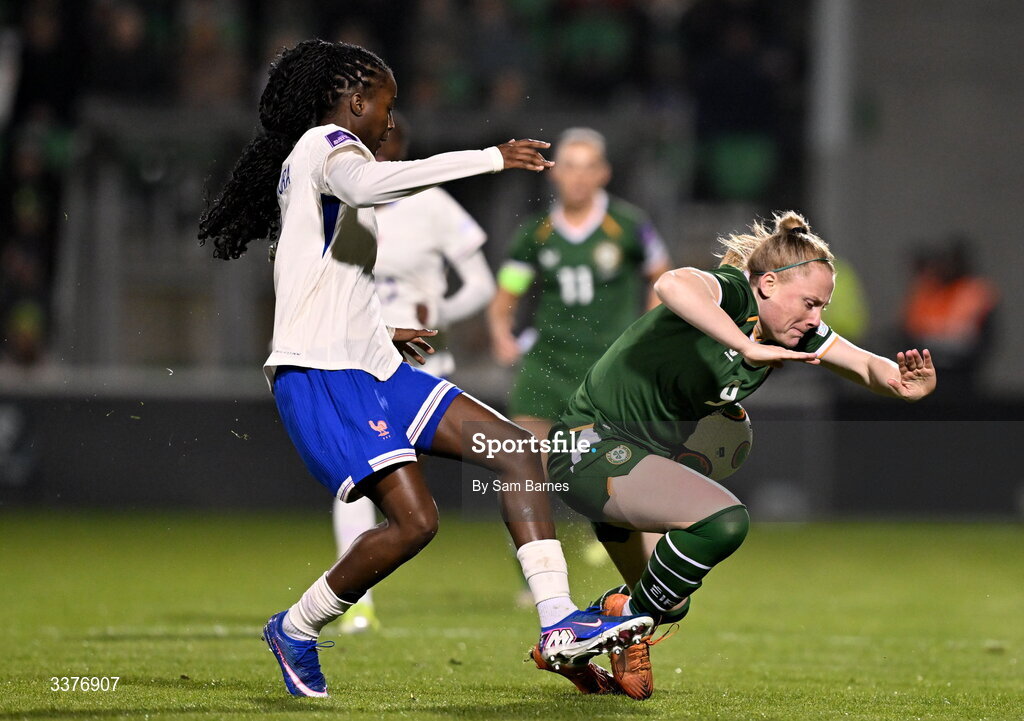 3 March 2026; Amber Barrett of Republic of Ireland in action against Thiniba Samoura of France during the 2027 FIFA Women’s World Cup Qualifier match between Republic of Ireland and France at Tallaght Stadium in Dublin. Photo by Sam Barnes/Sportsfile