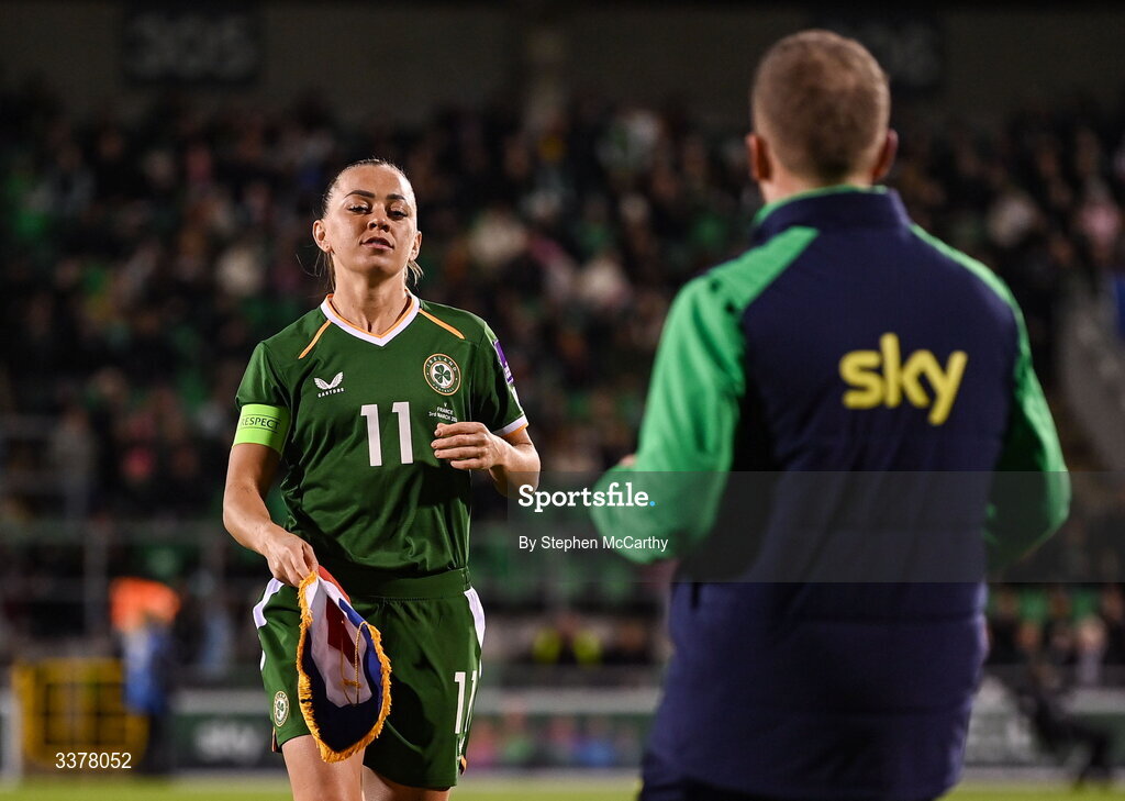 3 March 2026; Katie McCabe of Republic of Ireland and equipment officer Barry Sanfey before the 2027 FIFA Women’s World Cup Qualifier match between Republic of Ireland and France at Tallaght Stadium in Dublin. Photo by Stephen McCarthy/Sportsfile