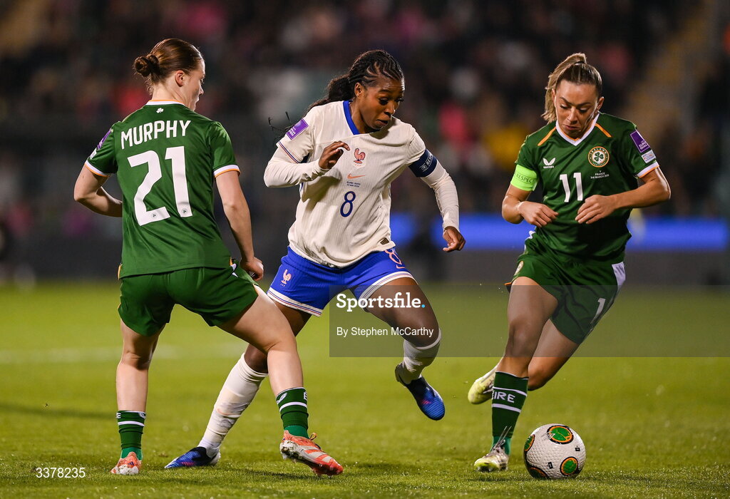 3 March 2026; Grace Geyoro of France in action against Emily Murphy, left, and Katie McCabe of Republic of Ireland during the 2027 FIFA Women’s World Cup Qualifier match between Republic of Ireland and France at Tallaght Stadium in Dublin. Photo by Stephen McCarthy/Sportsfile