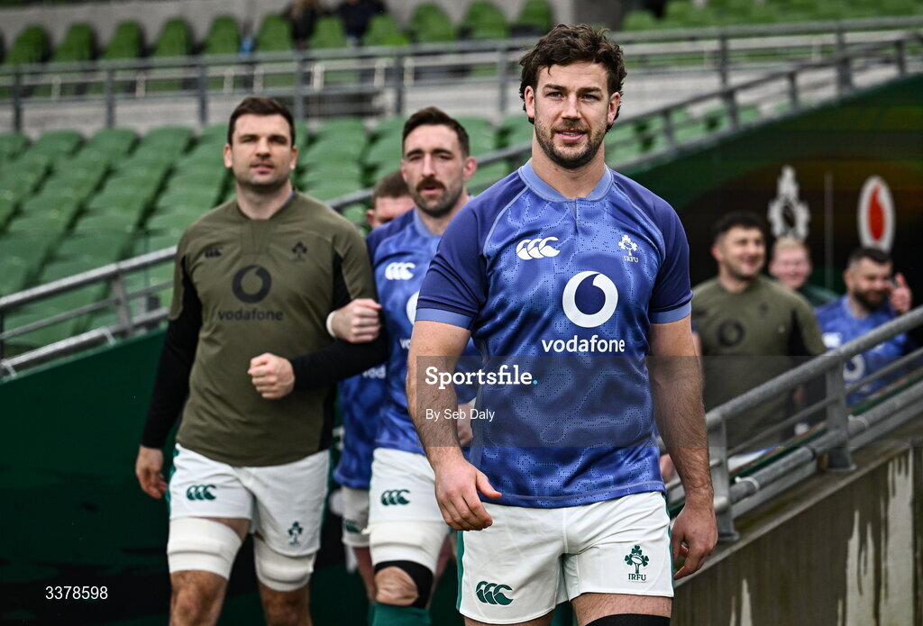 5 March 2026; Caelan Doris, right, leads his side out before an Ireland Rugby captain's run at the Aviva Stadium in Dublin. Photo by Seb Daly/Sportsfile