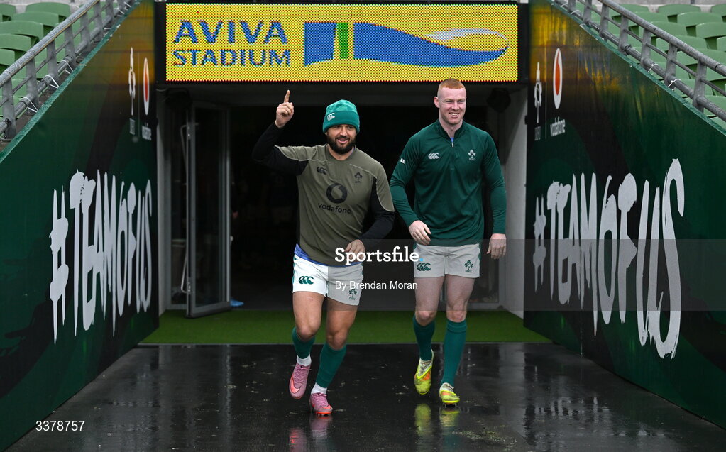 5 March 2026; Jamison Gibson-Park, left, and Nathan Doak make their way onto the pitch for the Ireland Rugby squad captain's run at the Aviva Stadium in Dublin. Photo by Brendan Moran/Sportsfile