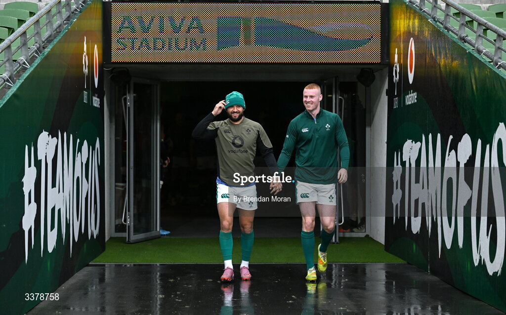 5 March 2026; Jamison Gibson-Park, left, and Nathan Doak make their way onto the pitch for the Ireland Rugby squad captain's run at the Aviva Stadium in Dublin. Photo by Brendan Moran/Sportsfile