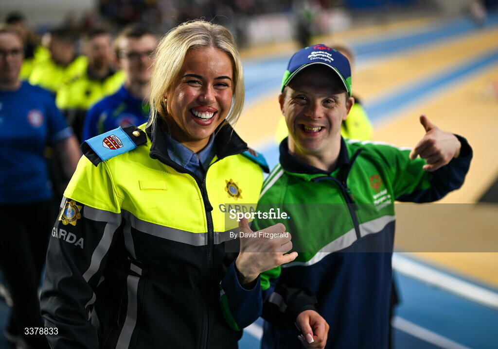 5 March 2026; Garda Katie Reddington and Special Olympics athlete David Corroon from Westmeath during the parade of athletes and Gardai for the Special Olympics Ireland Summer Games launch at the National Indoor Arena on the Sport Ireland Campus in Dublin. Photo by David Fitzgerald/Sportsfile