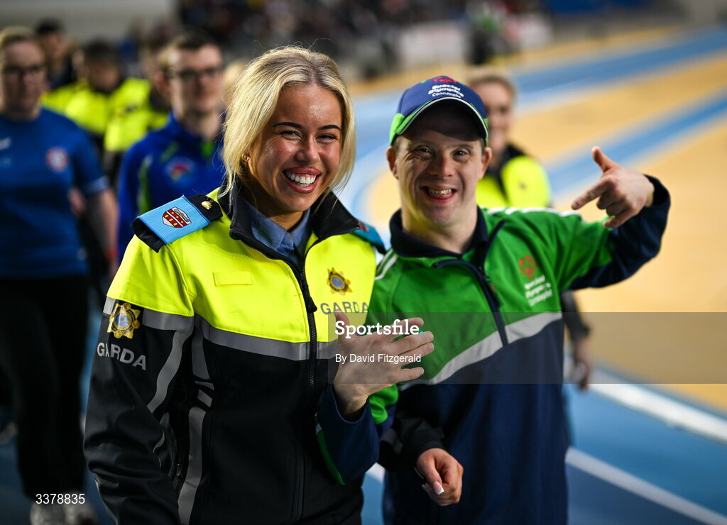5 March 2026; Garda Katie Reddington and Special Olympics athlete David Corroon from Westmeath during the parade of athletes and Gardai for the Special Olympics Ireland Summer Games launch at the National Indoor Arena on the Sport Ireland Campus in Dublin. Photo by David Fitzgerald/Sportsfile