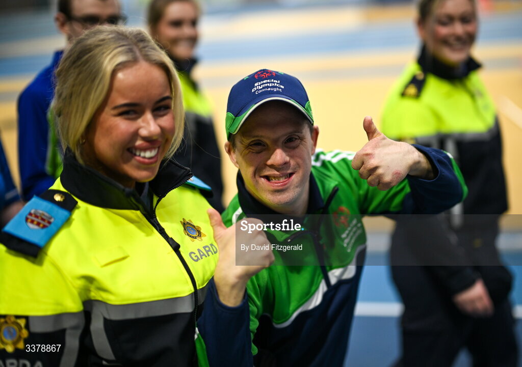 6 March 2026; Garda Katie Reddington and Special Olympics athlete David Corroon from Westmeath during the parade of athletes and Gardai for the Special Olympics Ireland Summer Games launch at the National Indoor Arena on the Sport Ireland Campus in Dublin. Photo by David Fitzgerald/Sportsfile