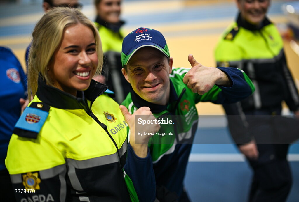 6 March 2026; Garda Katie Reddington and Special Olympics athlete David Corroon from Westmeath during the parade of athletes and Gardai for the Special Olympics Ireland Summer Games launch at the National Indoor Arena on the Sport Ireland Campus in Dublin. Photo by David Fitzgerald/Sportsfile