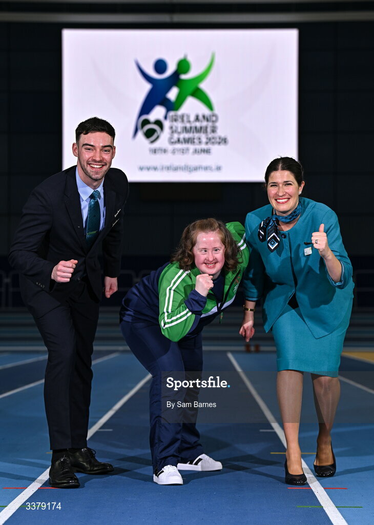 5 March 2026; Special Olympics athlete Bridget Walsh from Mayo, centre, pictured with Aer Lingus Cabin Crew members Shane Lynch and Rocío Orellana during the Special Olympics Ireland Summer Games launch at the National Indoor Arena on the Sport Ireland Campus in Dublin. Photo by Sam Barnes/Sportsfile