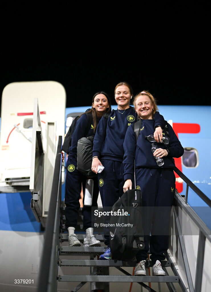 5 March 2026; Republic of Ireland players, from left, Abbie Larkin, Emily Murphy and Amber Barrett at Amsterdam's Schiphol Airport following Republic of Ireland women's travel to the Netherlands for their 2027 FIFA Women’s World Cup Qualifier against the Netherlands in Utrecht on Saturday. Photo by Stephen McCarthy/Sportsfile