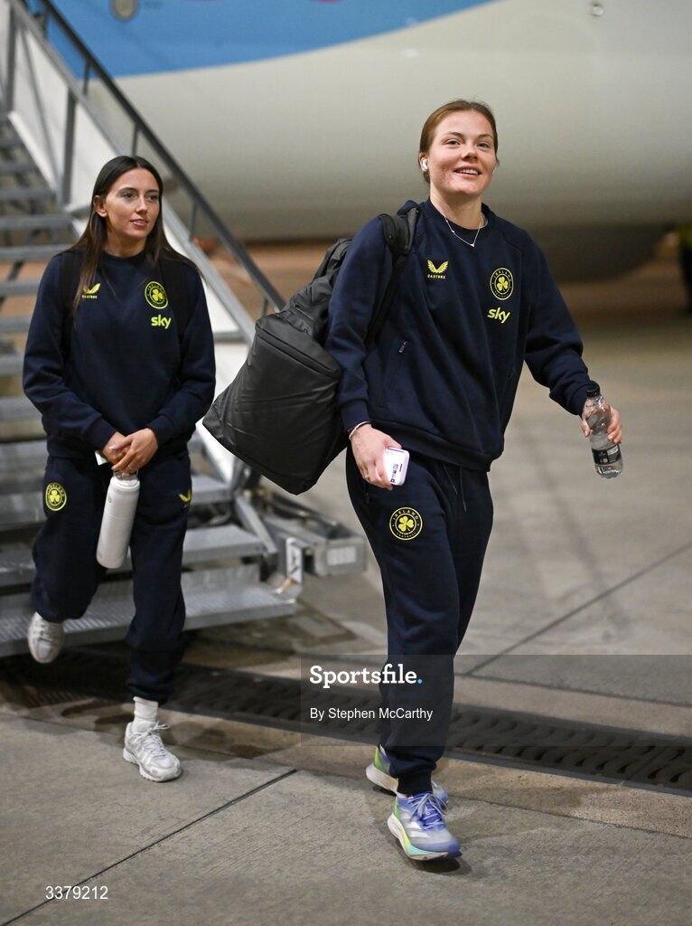 5 March 2026; Republic of Ireland's Emily Murphy, right, and Abbie Larkin at Amsterdam's Schiphol Airport following Republic of Ireland women's travel to the Netherlands for their 2027 FIFA Women’s World Cup Qualifier against the Netherlands in Utrecht on Saturday. Photo by Stephen McCarthy/Sportsfile