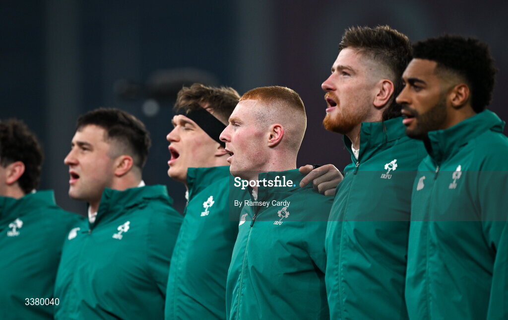 6 March 2026; Nathan Doak of Ireland, centre, and team-mates stand for the playing of the national anthems before the Guinness 6 Nations Rugby Championship match between Ireland and Wales at the Aviva Stadium in Dublin. Photo by Ramsey Cardy/Sportsfile