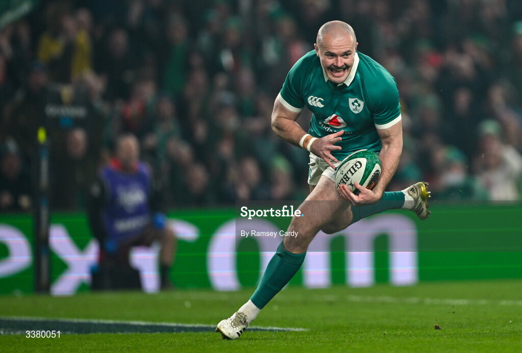 6 March 2026; Jacob Stockdale of Ireland scores his side's first try during the Guinness 6 Nations Rugby Championship match between Ireland and Wales at the Aviva Stadium in Dublin. Photo by Ramsey Cardy/Sportsfile