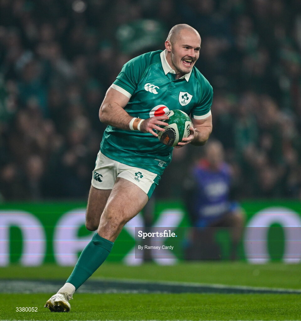 6 March 2026; Jacob Stockdale of Ireland scores his side's first try during the Guinness 6 Nations Rugby Championship match between Ireland and Wales at the Aviva Stadium in Dublin. Photo by Ramsey Cardy/Sportsfile
