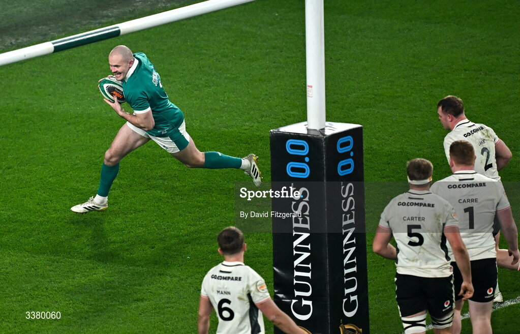6 March 2026; Jacob Stockdale of Ireland scores his side's first try during the Guinness 6 Nations Rugby Championship match between Ireland and Wales at the Aviva Stadium in Dublin. Photo by David Fitzgerald/Sportsfile