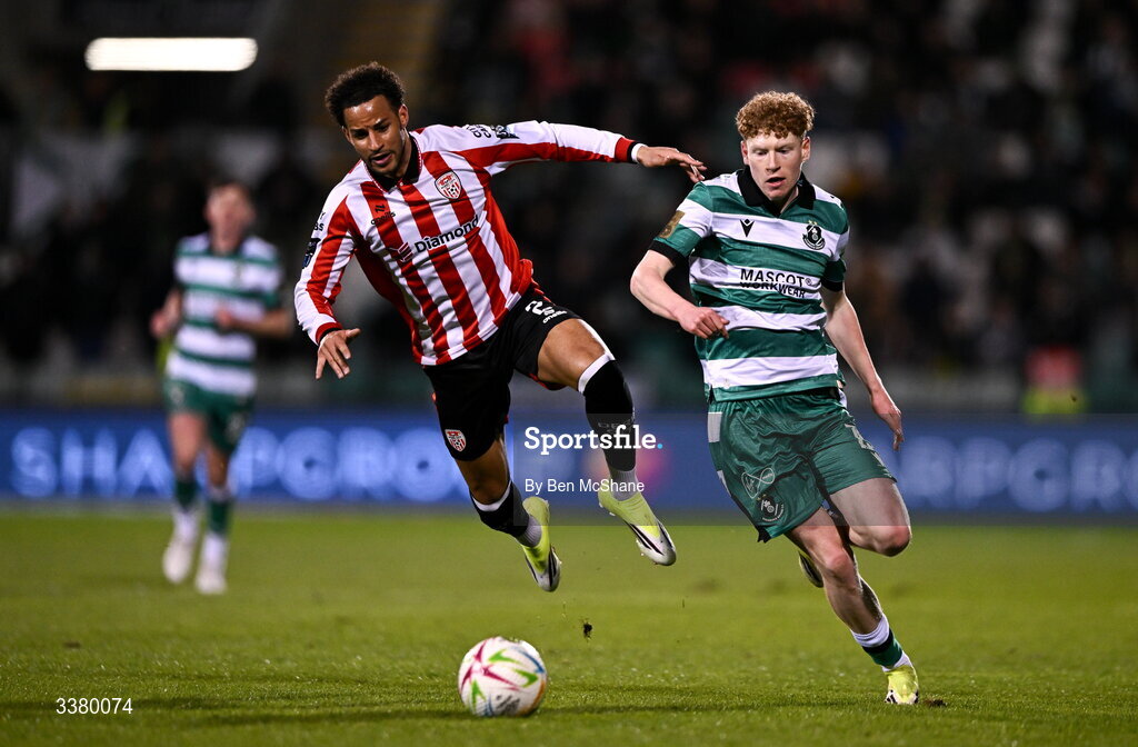 6 March 2026; Adam Brennan of Shamrock Rovers in action against Barry Cotter of Derry City during the SSE Airtricity Men's Premier Division match between Shamrock Rovers and Derry City at Tallaght Stadium in Dublin. Photo by Ben McShane/Sportsfile