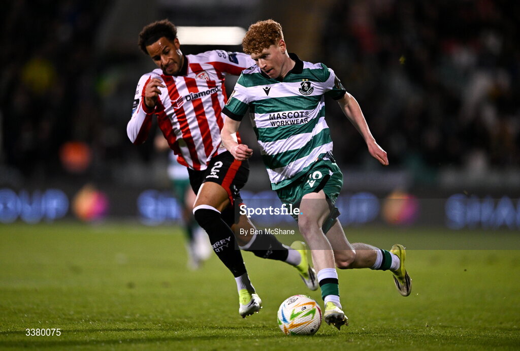 6 March 2026; Adam Brennan of Shamrock Rovers in action against Barry Cotter of Derry City during the SSE Airtricity Men's Premier Division match between Shamrock Rovers and Derry City at Tallaght Stadium in Dublin. Photo by Ben McShane/Sportsfile