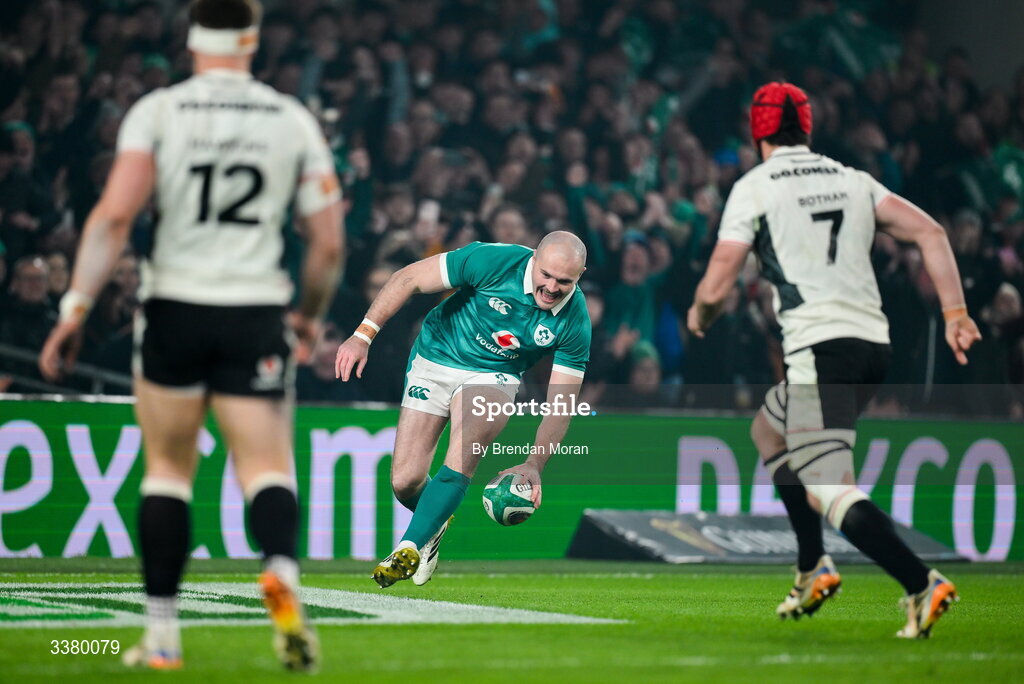 6 March 2026; Jacob Stockdale of Ireland scores his side's first try during the Guinness 6 Nations Rugby Championship match between Ireland and Wales at the Aviva Stadium in Dublin. Photo by Brendan Moran/Sportsfile
