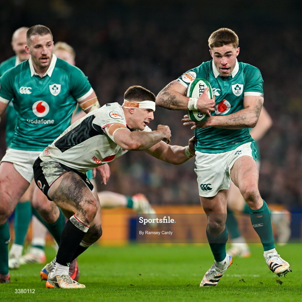6 March 2026; Jack Crowley of Ireland is tackled by Joe Hawkins of Wales during the Guinness 6 Nations Rugby Championship match between Ireland and Wales at the Aviva Stadium in Dublin. Photo by Ramsey Cardy/Sportsfile