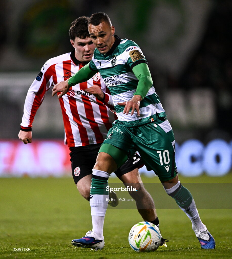 6 March 2026; Graham Burke of Shamrock Rovers in action against James Clarke of Derry City during the SSE Airtricity Men's Premier Division match between Shamrock Rovers and Derry City at Tallaght Stadium in Dublin. Photo by Ben McShane/Sportsfile