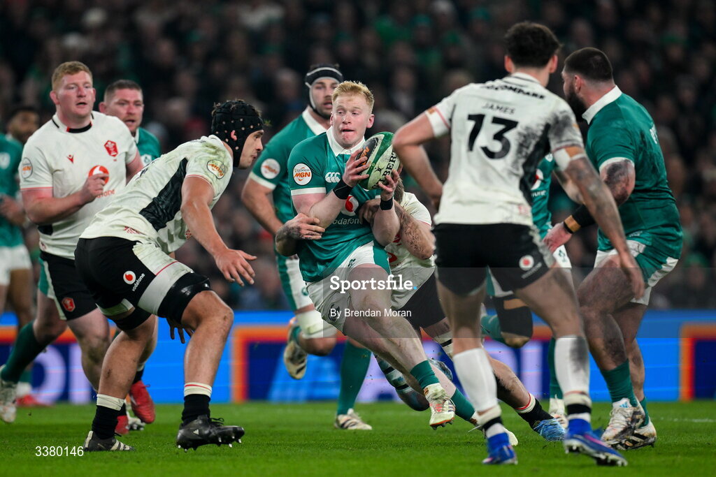 6 March 2026; Jamie Osborne of Ireland is tackled by Louis Rees-Zammit of Wales during the Guinness 6 Nations Rugby Championship match between Ireland and Wales at the Aviva Stadium in Dublin. Photo by Brendan Moran/Sportsfile