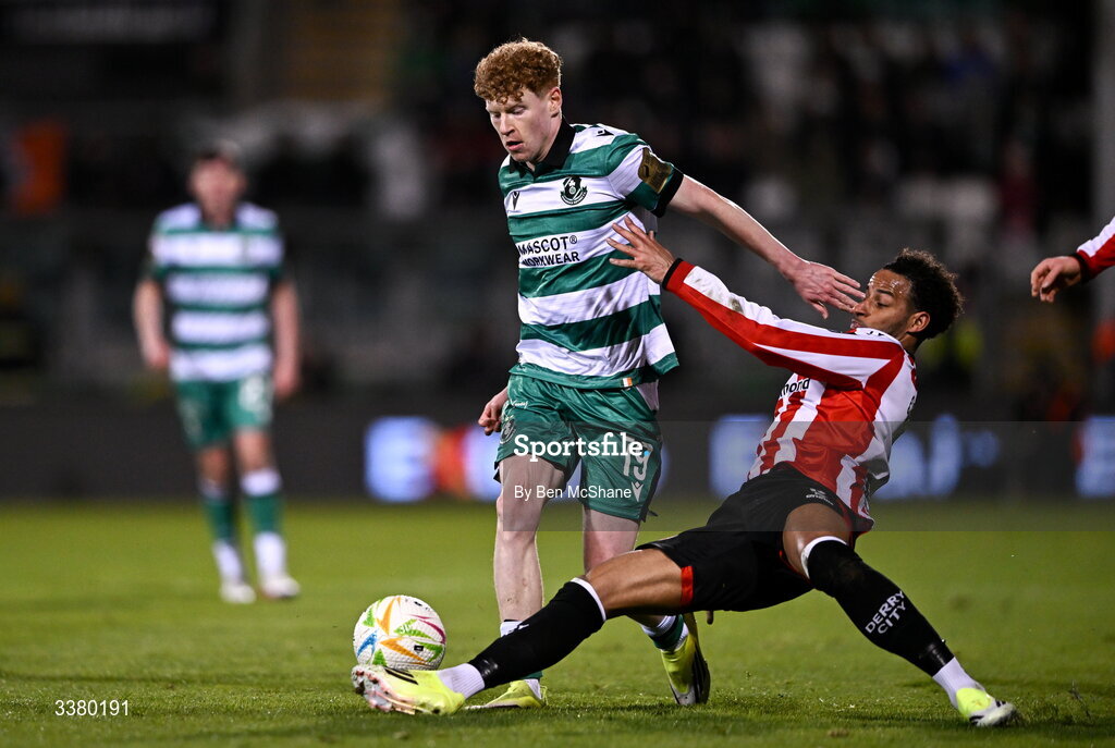 6 March 2026; Adam Brennan of Shamrock Rovers is tackled by Barry Cotter of Derry City during the SSE Airtricity Men's Premier Division match between Shamrock Rovers and Derry City at Tallaght Stadium in Dublin. Photo by Ben McShane/Sportsfile