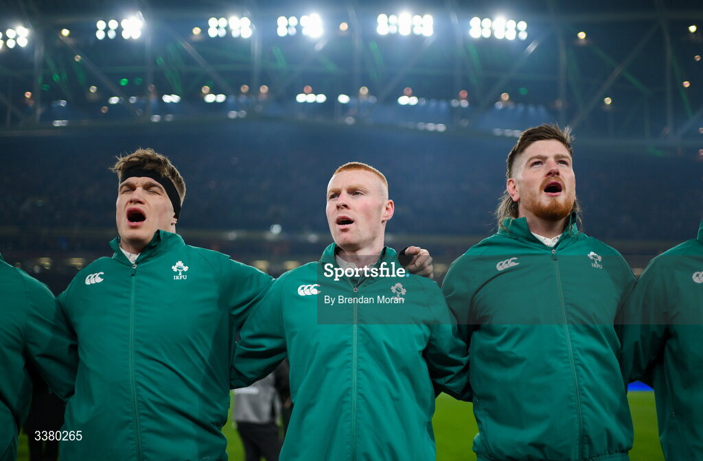 6 March 2026; Ireland players, from left, Josh van der Flier, Nathan Doak and Joe McCarthy stand for the playing of the national anthems before the Guinness 6 Nations Rugby Championship match between Ireland and Wales at the Aviva Stadium in Dublin. Photo by Brendan Moran/Sportsfile