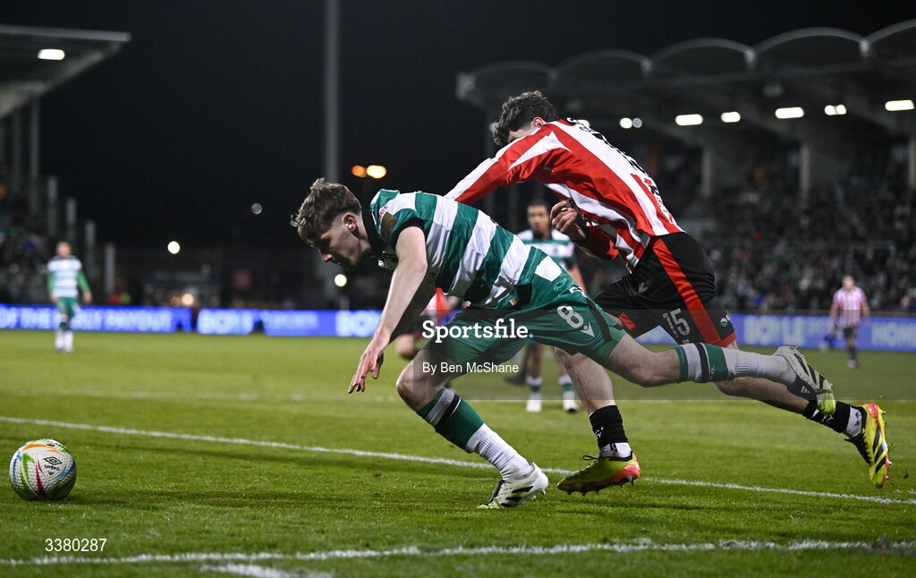 6 March 2026; Matt Healy of Shamrock Rovers is fouled by James Clarke of Derry City during the SSE Airtricity Men's Premier Division match between Shamrock Rovers and Derry City at Tallaght Stadium in Dublin. Photo by Ben McShane/Sportsfile