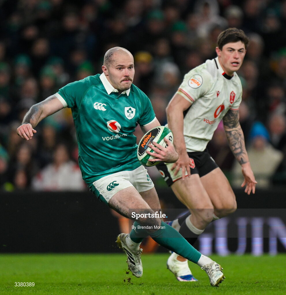 6 March 2026; Jacob Stockdale of Ireland in action against Louis Rees-Zammit of Wales during the Guinness 6 Nations Rugby Championship match between Ireland and Wales at the Aviva Stadium in Dublin. Photo by Brendan Moran/Sportsfile