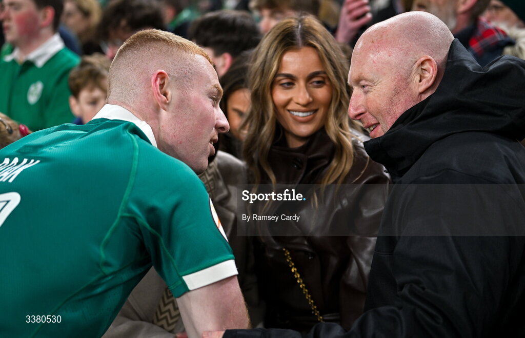 6 March 2026; Nathan Doak of Ireland with his father Neil, after his side's victory in the Guinness 6 Nations Rugby Championship match between Ireland and Wales at the Aviva Stadium in Dublin. Photo by Ramsey Cardy/Sportsfile