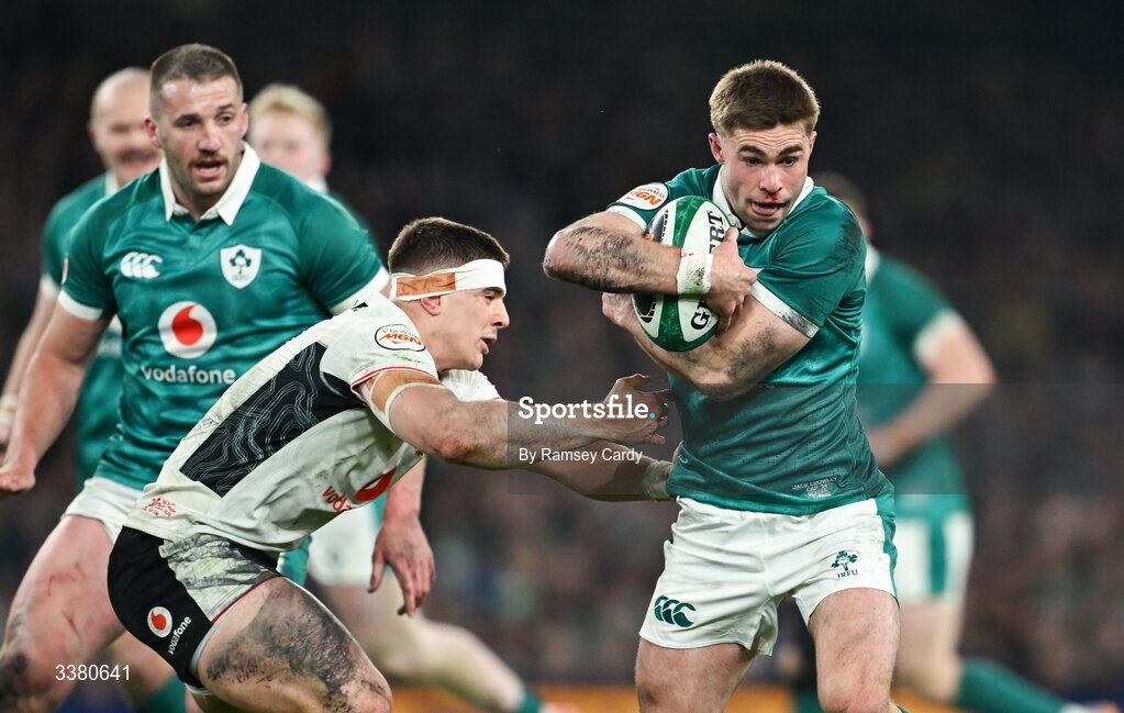 6 March 2026; Jack Crowley of Ireland is tackled by Joe Hawkins of Wales during the Guinness 6 Nations Rugby Championship match between Ireland and Wales at the Aviva Stadium in Dublin. Photo by Ramsey Cardy/Sportsfile