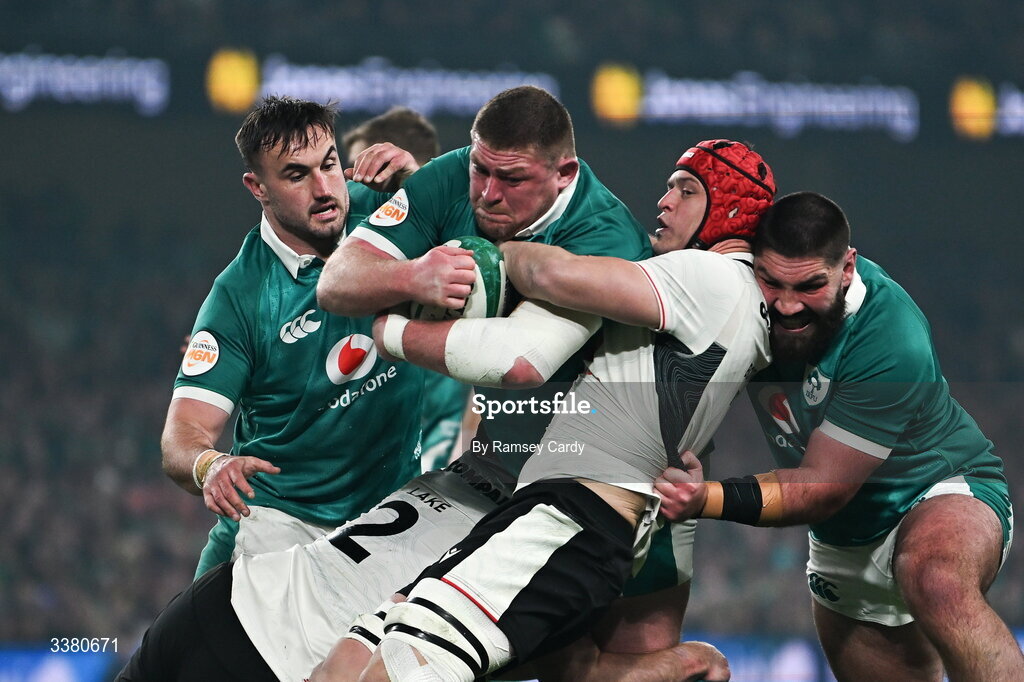 6 March 2026; Tadhg Furlong of Ireland, supported by Rónan Kelleher and Tom O’Toole, is tackled by James Botham of Wales during the Guinness 6 Nations Rugby Championship match between Ireland and Wales at the Aviva Stadium in Dublin. Photo by Ramsey Cardy/Sportsfile