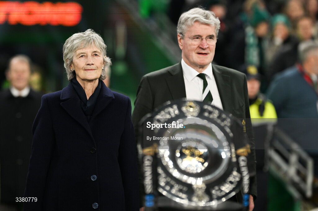 6 March 2026; President of Ireland Catherine Connolly, left, and IRFU president John O'Driscoll make their way to meet the teams before the Guinness 6 Nations Rugby Championship match between Ireland and Wales at the Aviva Stadium in Dublin. Photo by Brendan Moran/Sportsfile