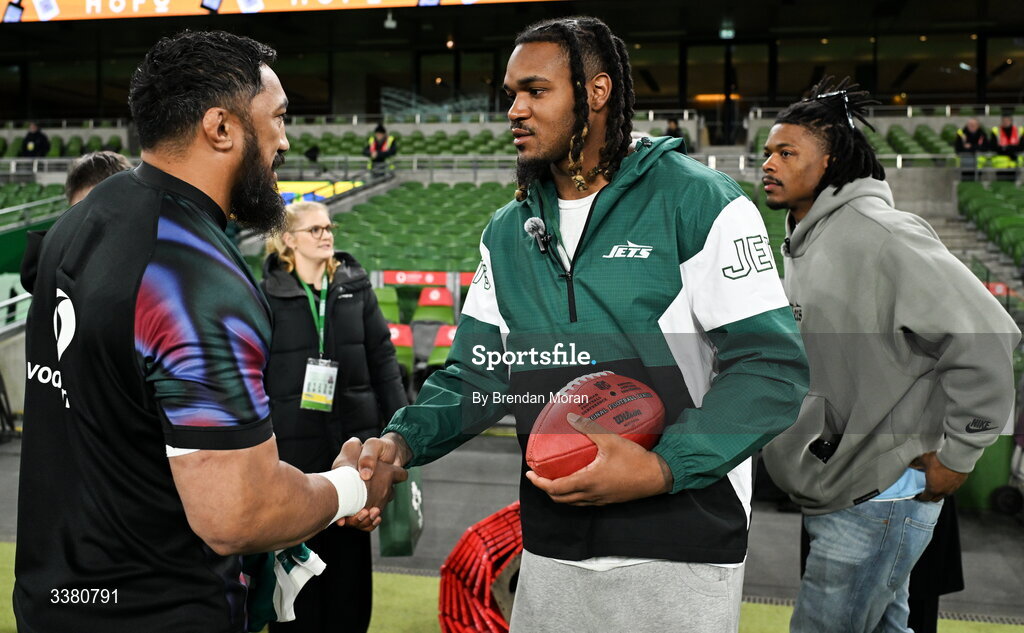 6 March 2026; New York Jets NFL player Jamien Sherwood, centre, and Marcelino McCrary-Ball with Bundee Aki of Ireland before the Guinness 6 Nations Rugby Championship match between Ireland and Wales at the Aviva Stadium in Dublin. Photo by Brendan Moran/Sportsfile