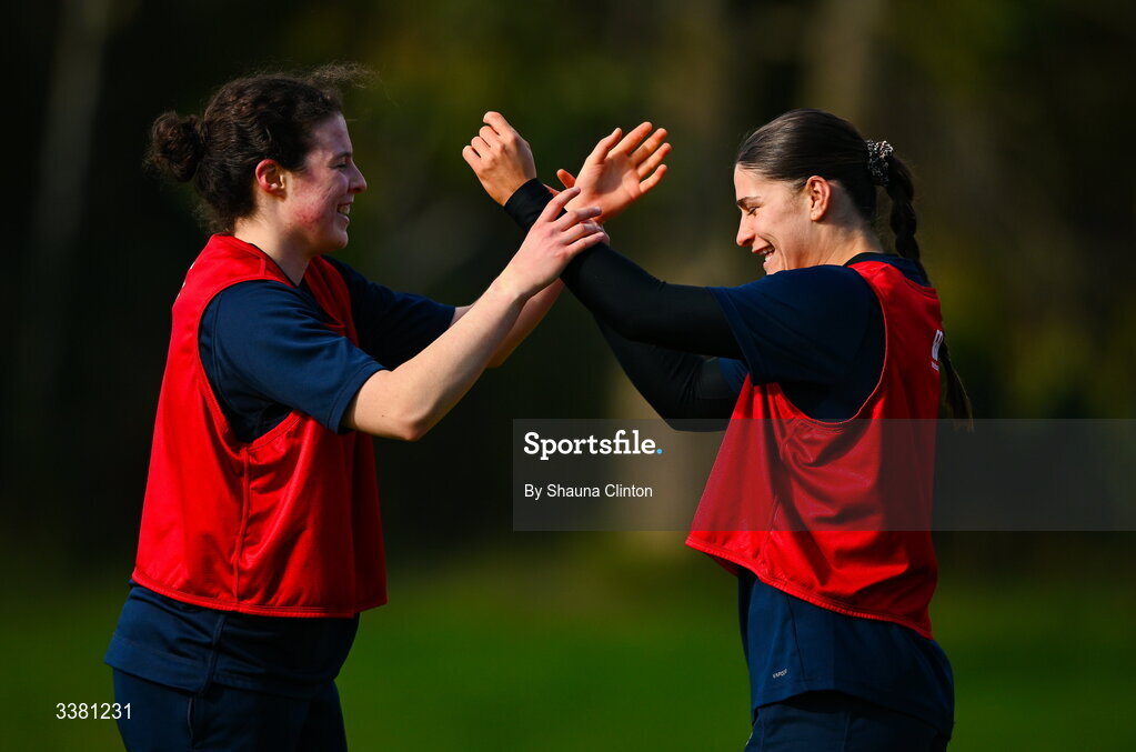7 March 2026; Wolfhounds players Abby Moyles, left, and Vicky Elmes Kinlan warm-up before the Celtic Challenge Round 10 match between Wolfhounds and Clovers at Belfield Bowl in Dublin. Photo by Shauna Clinton/Sportsfile