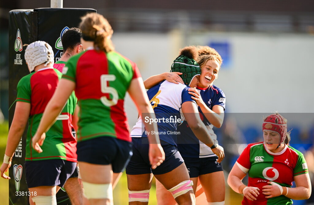 7 March 2026; Grace Moore of Wolfhounds, left, is congratulated by team-mates after scoring her side's first try during the Celtic Challenge Round 10 match between Wolfhounds and Clovers at Belfield Bowl in Dublin. Photo by Shauna Clinton/Sportsfile