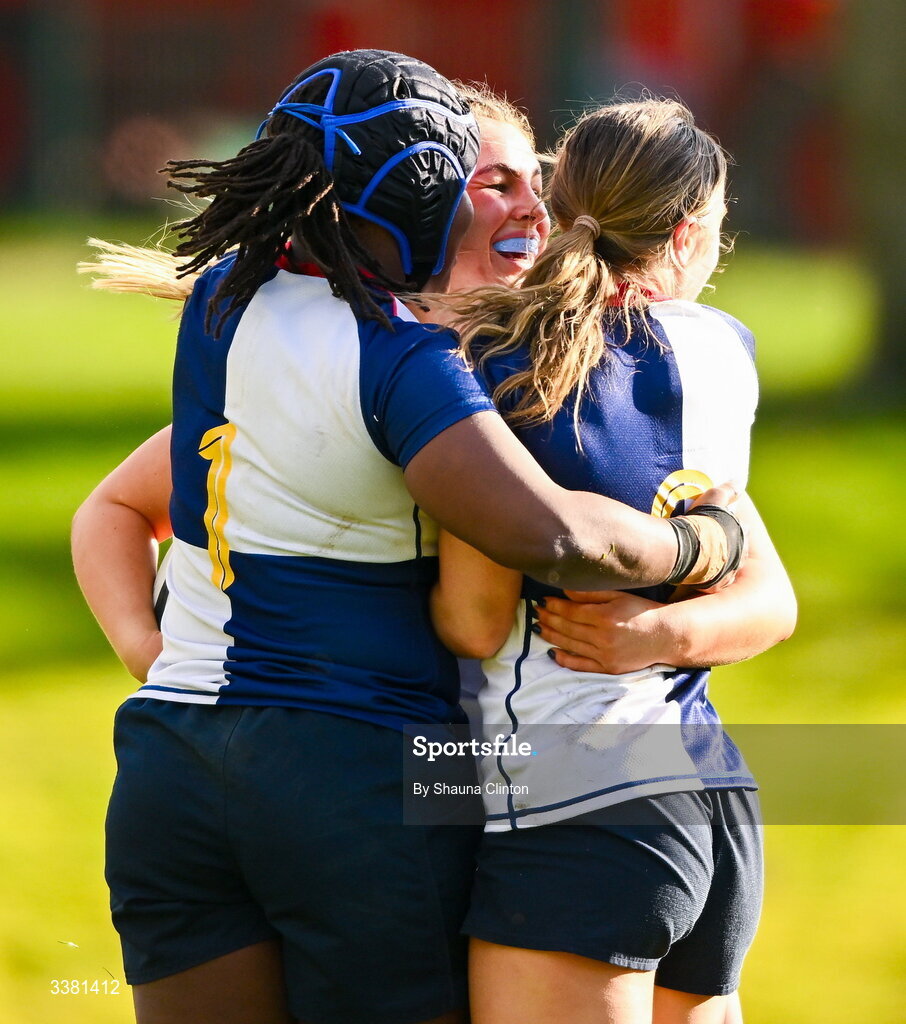 7 March 2026; India Daley of Wolfhounds, centre, is congratulated by team-mates after scoring a try during the Celtic Challenge Round 10 match between Wolfhounds and Clovers at Belfield Bowl in Dublin. Photo by Shauna Clinton/Sportsfile