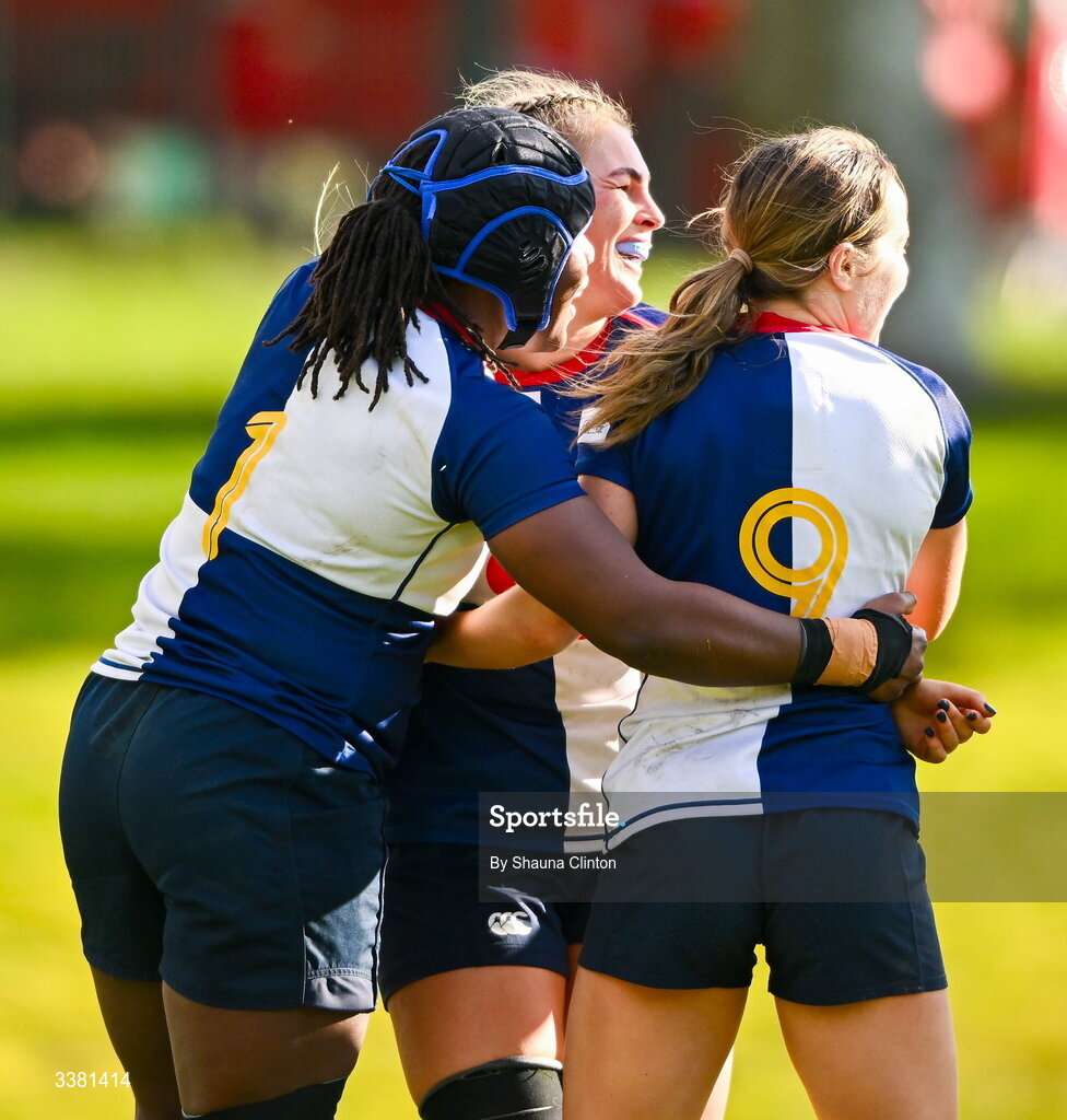 7 March 2026; India Daley of Wolfhounds, centre, is congratulated by team-mates after scoring a try during the Celtic Challenge Round 10 match between Wolfhounds and Clovers at Belfield Bowl in Dublin. Photo by Shauna Clinton/Sportsfile