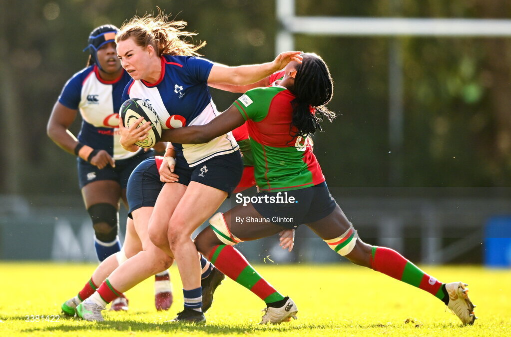 7 March 2026; Niamh Marley of Wolfhounds is tackled by Sadhbh McGrath, left, and Faith Oviawe during the Celtic Challenge Round 10 match between Wolfhounds and Clovers at Belfield Bowl in Dublin. Photo by Shauna Clinton/Sportsfile