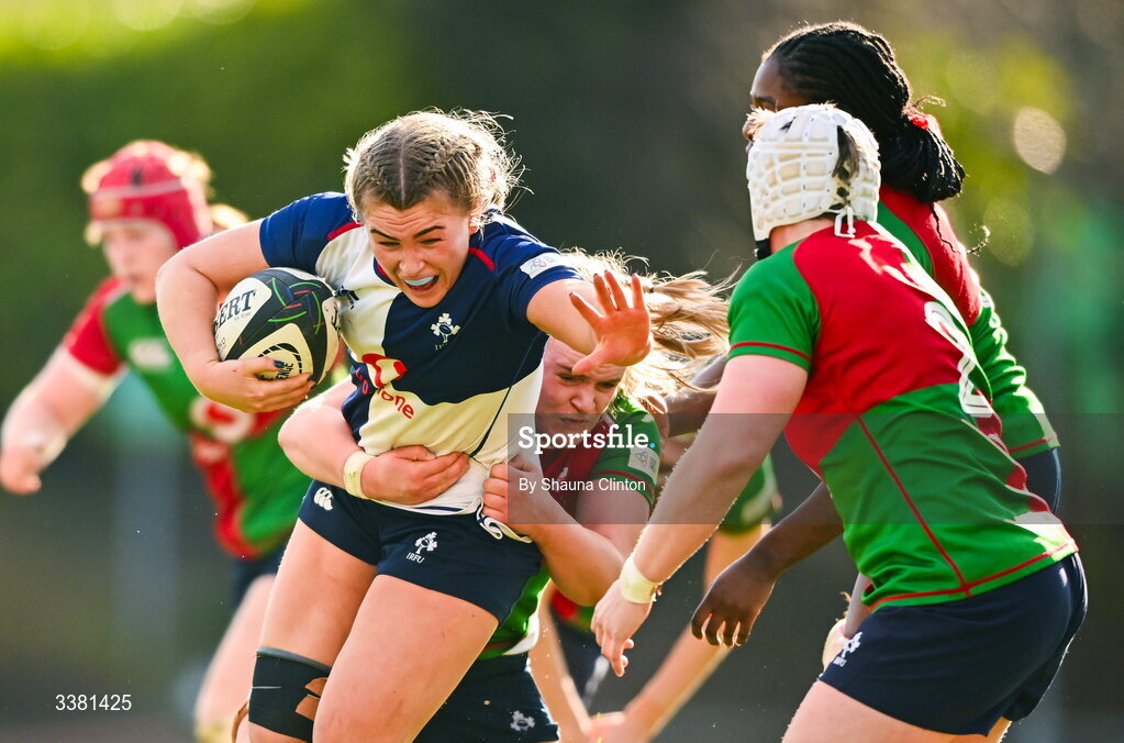 7 March 2026; India Daley of Wolfhounds is tackled by Ailish Quinn of Clovers during the Celtic Challenge Round 10 match between Wolfhounds and Clovers at Belfield Bowl in Dublin. Photo by Shauna Clinton/Sportsfile