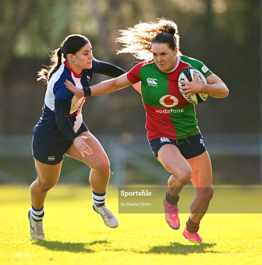 7 March 2026; Béibhinn Parsons of Clovers is tackled by Vicky Elmes Kinlan of Wolfhounds during the Celtic Challenge Round 10 match between Wolfhounds and Clovers at Belfield Bowl in Dublin. Photo by Shauna Clinton/Sportsfile